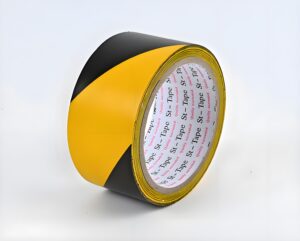 Bulk rolls of custom printed warning tape ready for shipping and packaging.